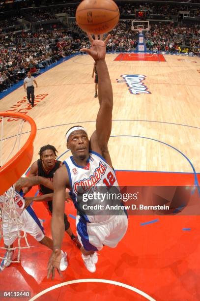 Al Thornton of the Los Angeles Clippers rises for a rebound during a game against the Toronto Raptors at Staples Center on December 22, 2008 in Los...