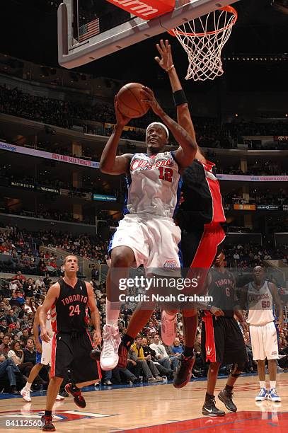 Al Thornton of the Los Angeles Clippers goes up for a shot during a game against the Toronto Raptors at Staples Center on December 22, 2008 in Los...