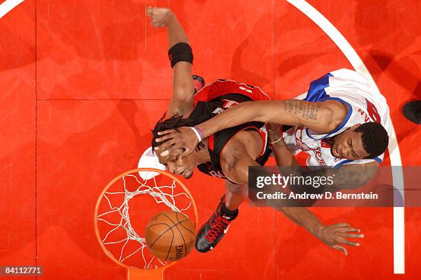 Chris Bosh of the Toronto Raptors has his shot challenged by DeAndre Jordan of the Los Angeles Clippers at Staples Center on December 22, 2008 in Los...