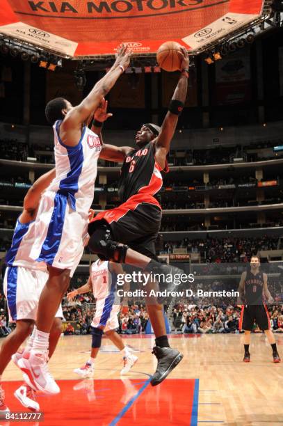 Jermaine O'Neal of the Toronto Raptors rises for a shot against DeAndre Jordan of the Los Angeles Clippers at Staples Center on December 22, 2008 in...