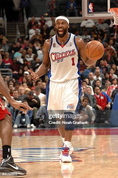 Baron Davis of the Los Angeles Clippers reacts while dribbling the ball up the court against the Toronto Raptors at Staples Center on December 22,...