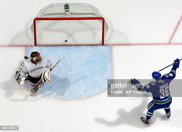Jannik Hansen of the Vancouver Canucks celebrates a Canuck goal on Jonas Hiller of the Anaheim Ducks during their game at General Motors Place on...
