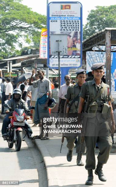 Sri Lanka army soldiers patrol a street in Colombo on December 23, 2008. Sri Lanka's Tamil Tiger rebels claimed killing at least 100 government...