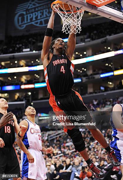 Chris Bosh of the Toronto Raptors slam dunks during the game against the Los Angeles Clippers at Staples Center on December 22, 2008 in Los Angeles,...