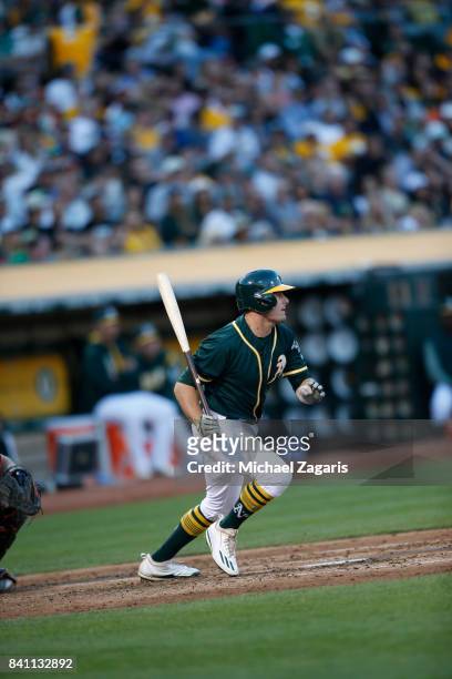 Jaycob Brugman of the Oakland Athletics bats during the game against the San Francisco Giants at the Oakland Alameda Coliseum on July 31, 2017 in...