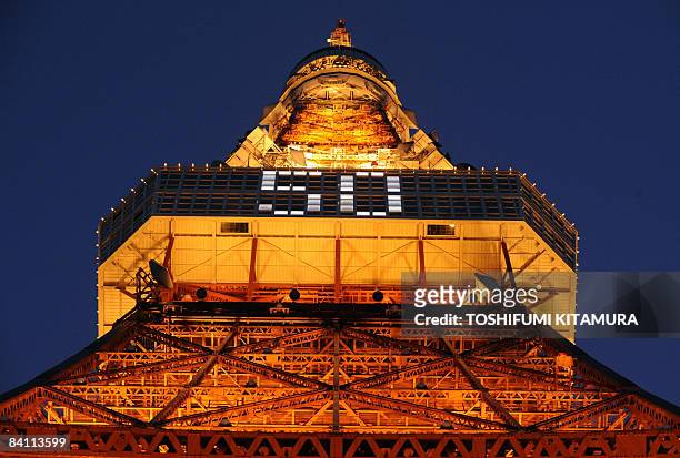 The Tokyo Tower is lit as the tower marks it's 50th anniversary in Tokyo on December 23, 2008. The Tokyo Tower turned 50 with a rock concert, sales...