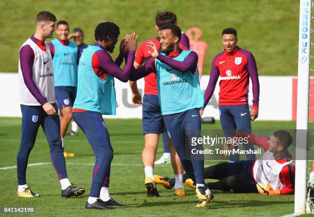 Nathanial Chalobah of England and Ryan Bertrand during an England training session at St Georges Park on August 31, 2017 in Burton-upon-Trent,...