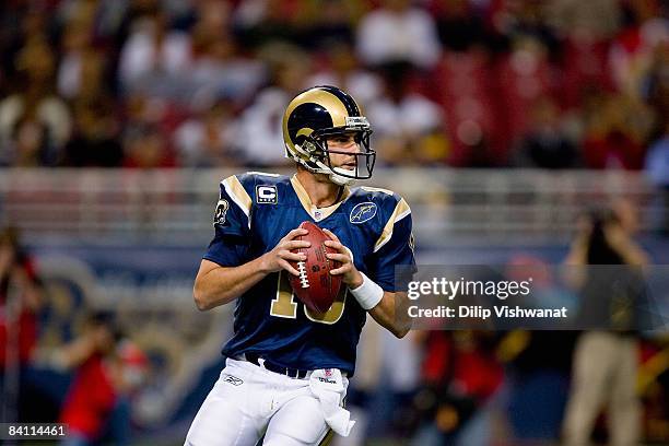 Marc Bulger of the St. Louis Rams drops back to pass during the game against the San Francisco 49ers at the Edward Jones Dome on December 21, 2008 in...