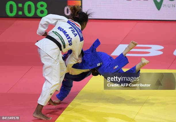 France' Clarisse Agbegnenou competes with Spain's Isabel Puche during their match in the womens -63kg category at the World Judo Championships in...