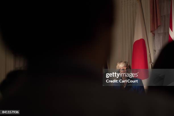 Britain's Prime Minister, Theresa May, speaks during a press conference with Japan's Prime Minister Shinzo Abe on August 31, 2017 in Tokyo, Japan....