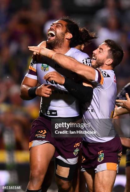 Adam Blair of the Broncos celebrates after scoring a try during the round 26 NRL match between the North Queensland Cowboys and the Brisbane Broncos...