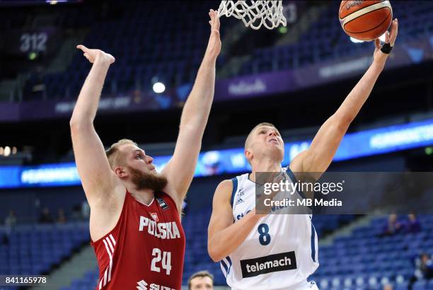 Przemyslaw Karnowski of Poland Edo Muric of Slovenia during the FIBA Eurobasket 2017 Group A match between Slovenia and Poland on August 31, 2017 in...