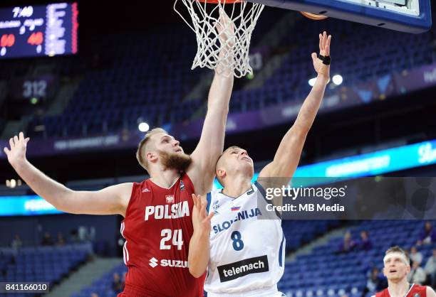 Przemyslaw Karnowski of Poland Edo Muric of Slovenia during the FIBA Eurobasket 2017 Group A match between Slovenia and Poland on August 31, 2017 in...