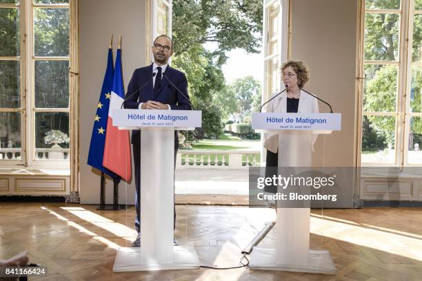 Edouard Philippe, France's prime minister, left, speaks as Muriel Penicaud, France's minister for labour, looks on during a news conference in Paris,...