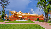 A reclining Buddha statue at Wat Pha That Luang lacated in Vientiane, Loas