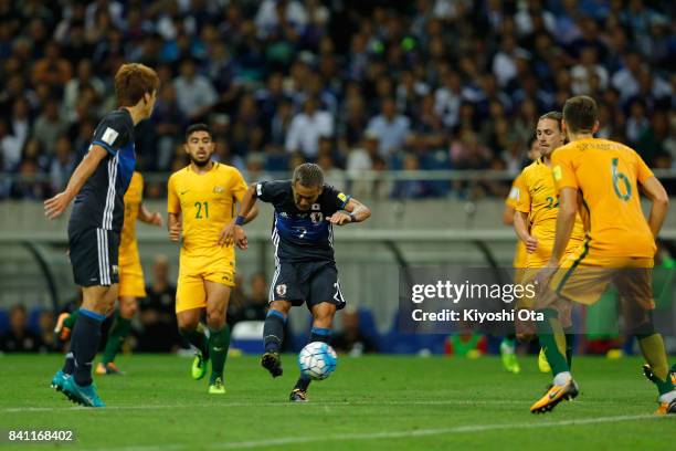 Yosuke Ideguchi of Japan scores his side's second goal during the FIFA World Cup Qualifier match between Japan and Australia at Saitama Stadium on...