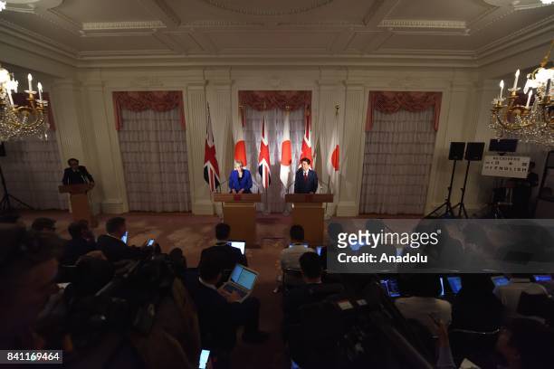 British Prime Minister Theresa May and Japanese Prime Minister Shinzo Abe hold a joint press conference at the Akasaka Palace State Guest House in...