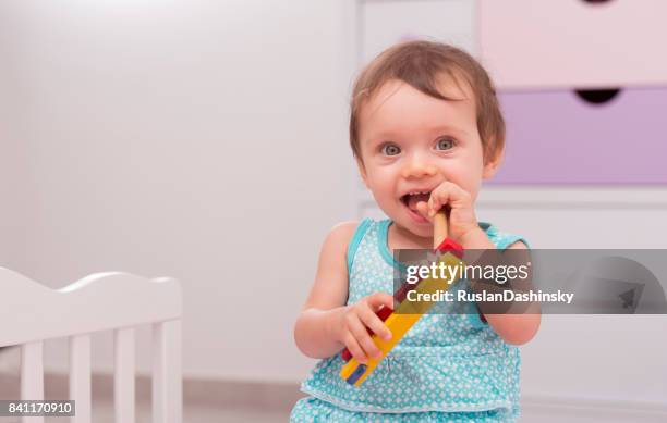 Girls Tween Rattle Rattle Toy Photos and Premium High Res Pictures - Getty Images