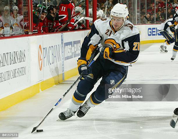 Drew Stafford of the Buffalo Sabres skates against the New Jersey Devils at the Prudential Center on December 13, 2008 in Newark, New Jersey. The...
