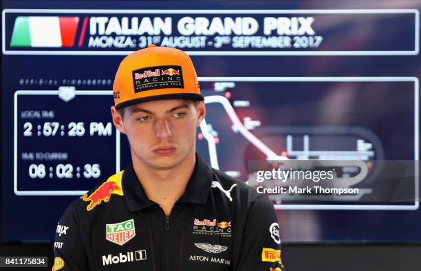 Max Verstappen of Netherlands and Red Bull Racing looks on in the garage during previews for the Formula One Grand Prix of Italy at Autodromo di...