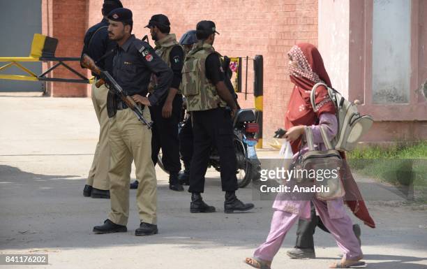 Pakistani security forces are seen outside the Adiyala Jail in Rawalpindi, Pakistan on August 31 where an anti-terrorism court has declared former...