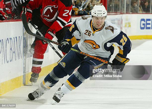 Thomas Vanek of the Buffalo Sabres skates against the New Jersey Devils at the Prudential Center on December 13, 2008 in Newark, New Jersey. The...