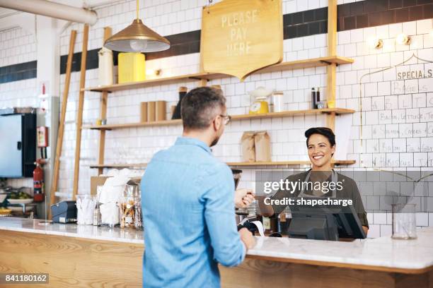 great customer service is critical to coffee shop success - great customer service stock pictures, royalty-free photos & images