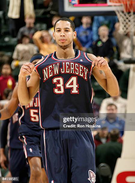 Devin Harris of the New Jersey Nets celebrates after hitting the winning basket over the Indiana Pacers at Conseco Fieldhouse December 23, 2008 in...