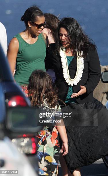 President-elect Barack Obama's wife Michelle Obama and sister Maya Soetoro-Ng return from a seaside memorial for Obama's late grandmother Madelyn...