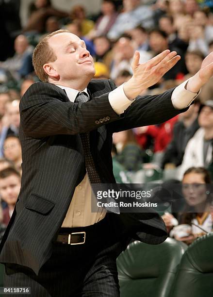 Head coach Lawrence Frank of the New Jersey Nets motions for one of his players to enter the game against the Indiana Pacers at Conseco Fieldhouse...