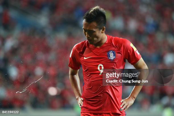Kim Shin Wook of South Korea spits with frustration after the scoreless draw in the FIFA World Cup Russia Asian qualifier match between South Korea...