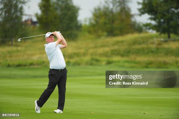 Richard Finch of England plays his second shot on the 18th hole during day one of the D+D REAL Czech Masters at Albatross Golf Resort on August 31,...