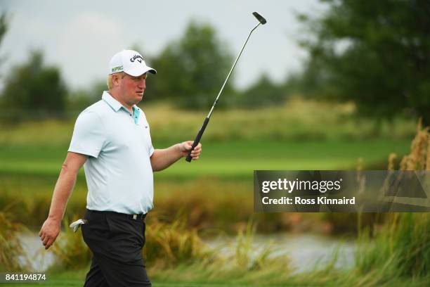 Richard Finch of England walks on the 18th hole during day one of the D+D REAL Czech Masters at Albatross Golf Resort on August 31, 2017 in Prague,...