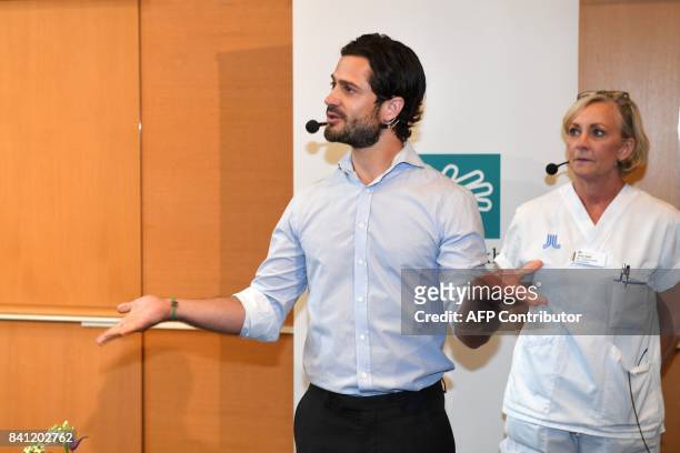 Prince Carl Philip of Sweden meets the media at the Danderyds hospital in North Stockholm where Princess Sofia gave birth to a son on August 31,...