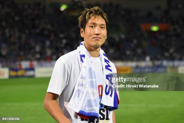 Genki Haraguchi of Japan applauds supporters after his side's 2-0 victory and qualified for the FIFA World Cup Russia after the FIFA World Cup...