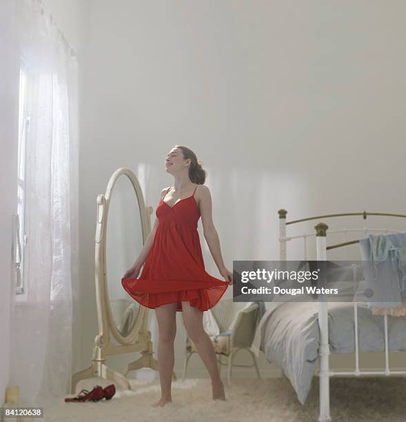 young woman in red dress. - drapeado stock pictures, royalty-free photos & images