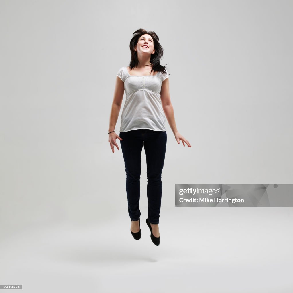 Young female jumping for joy