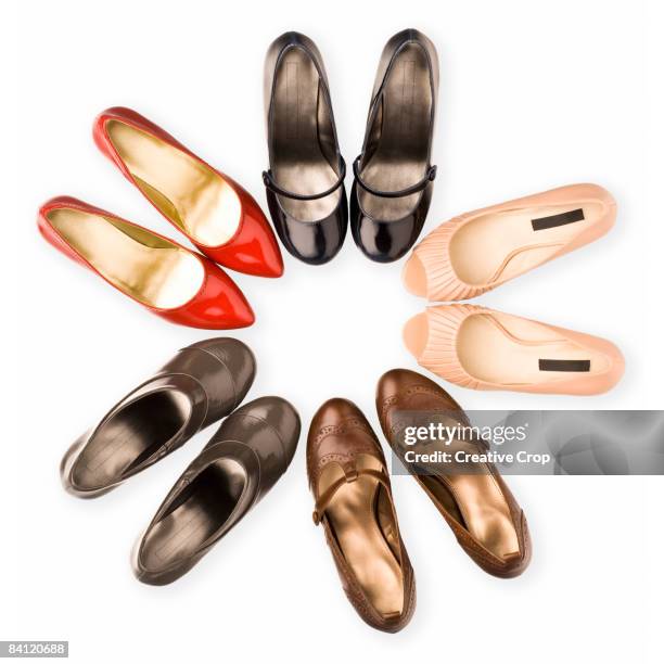 circle of five pairs of woman's shoes - high heels on white stock pictures, royalty-free photos & images