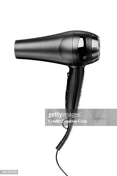 hairdryer - brushing photos et images de collection