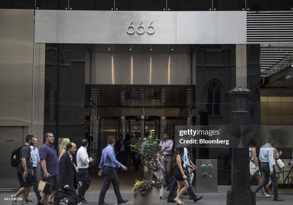 666 Building Rockefeller Pedestrians pass in front of the 666 Fifth Avenue building in New ...