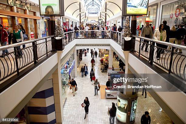 Shoppers packed into Tysons Corner Center, a mall in suburban Washington, on Christmas Eve on December 24, 2008 in McLean, Virginia. Retailers,...