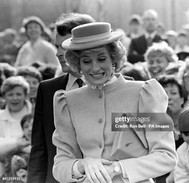 Diana, Princess of Wales, is in a jolly mood as she is greeted by cheering crowds during her surprise visit to Ulster, her first to the Province.