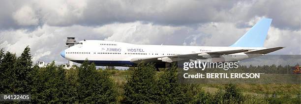 File photo taken August 28, 2008 shows a Boeing 747-200 aircraft that will be the world's first 'Jumbo Hostel' as it is towed to it's parking spot at...