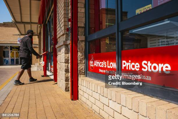 Customer enters a HiFi Corp. Store, operated by Steinhoff International Holdings NV, in Pretoria, South Africa, on Thursday, Aug. 31, 2017....