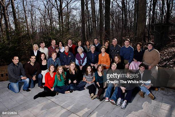 In this handout image provided by the White House, US President George W. Bush and family gather on Christmas December 25, 2008 at Camp David,...