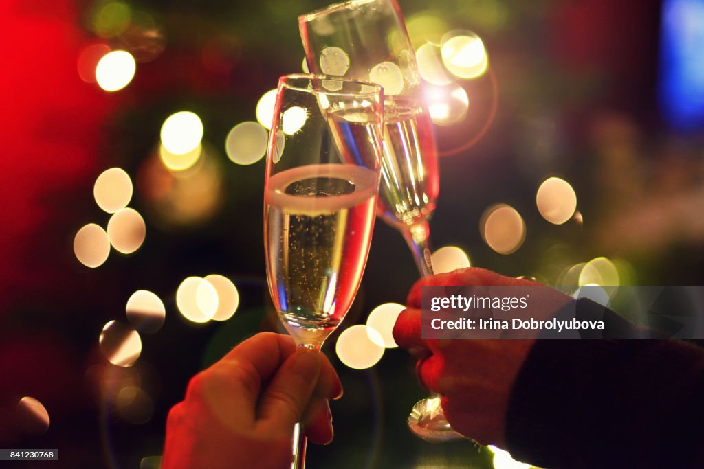 Couple drinking champagne from personal perspective