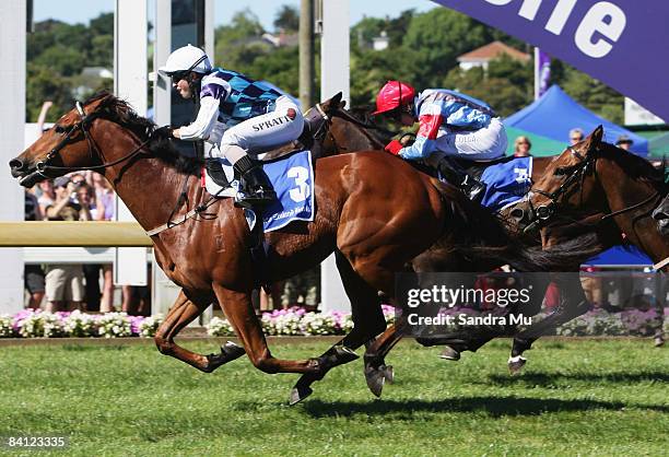 Sam Spratt riding Castle Heights wins the Dunstan Feeds Championship Qualifier during the New Zealand Herald Christmas Carnival meeting at Ellerslie...