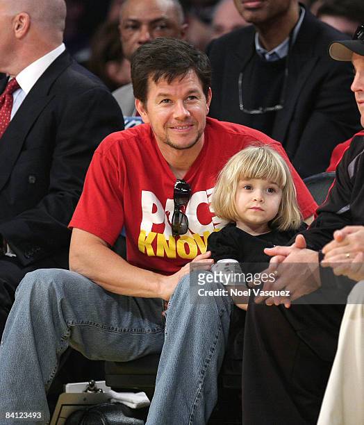 Actor Mark Wahlberg and daughter Ella Rae Wahlberg attend the Los Angeles Lakers vs Boston Celtics game at the Staples Center on December 25, 2008 in...