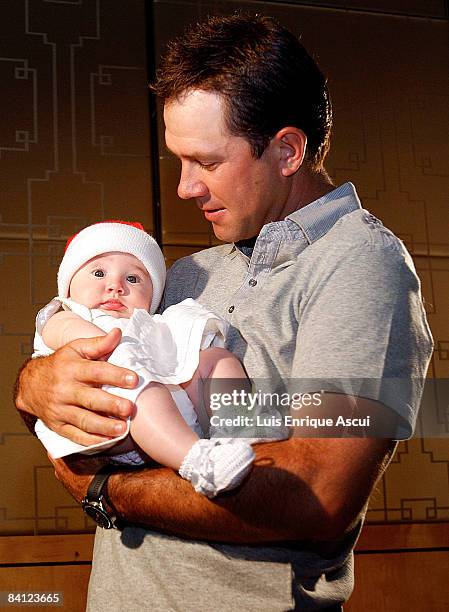 Ricky Ponting poses with his daughter Emmy during the Australian cricket team's Christmas lunch at Crown Towers on December 25, 2008 in Melbourne,...