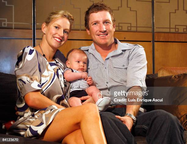 Brad Haddin poses with his wife Karina and three month old son Zac during the Australian cricket team's Christmas lunch at Crown Towers on December...